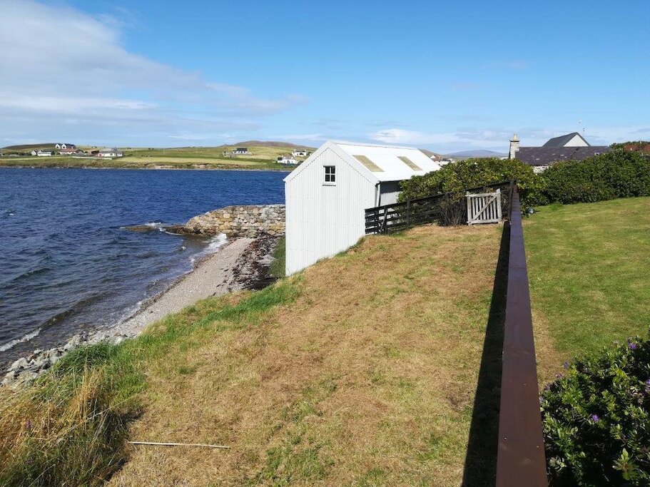 Shoreline below the house